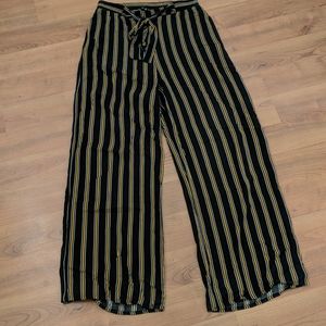 Black and yellow stripe wide leg pants.